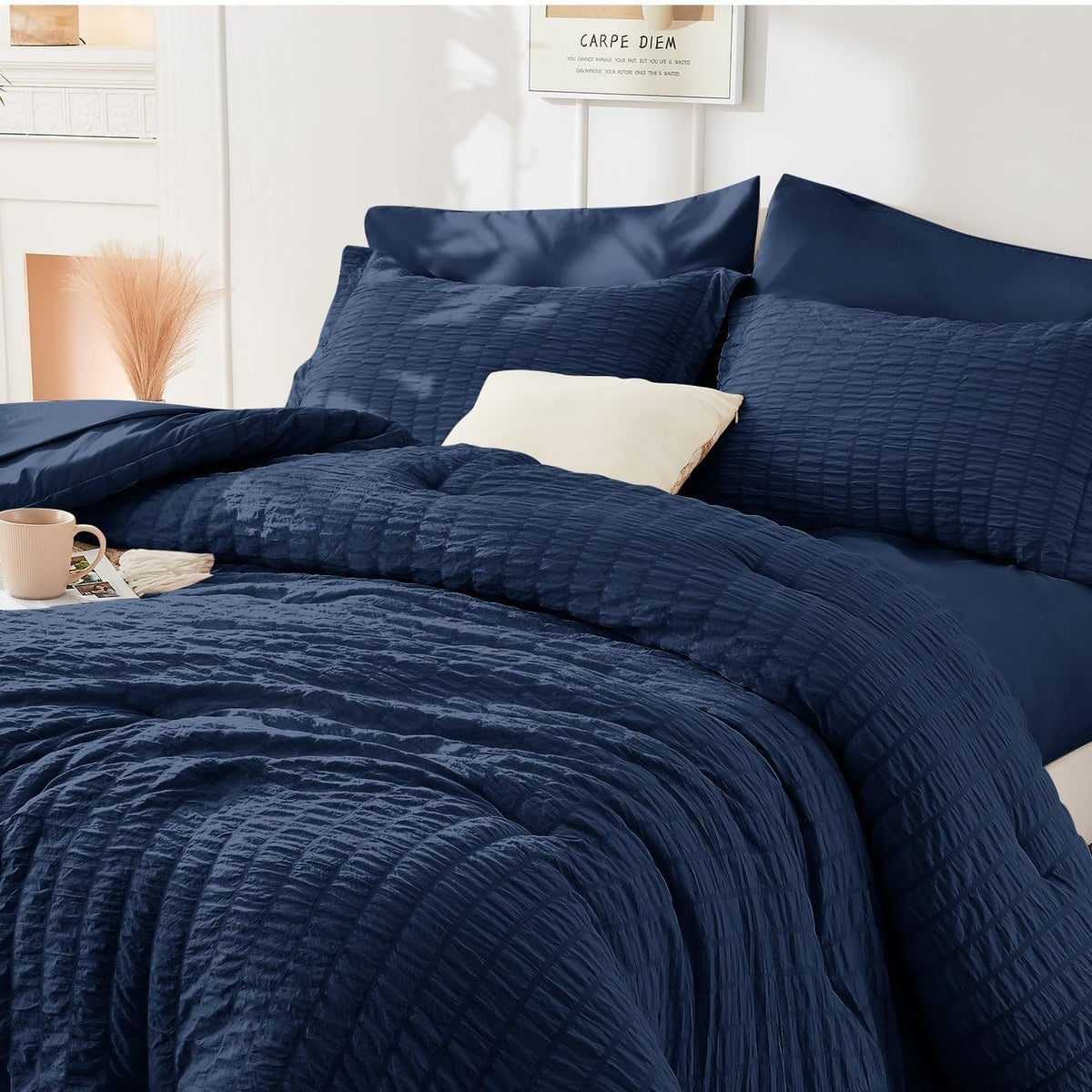HYMOKEGE navy blue bedding set in a cozy bedroom setup