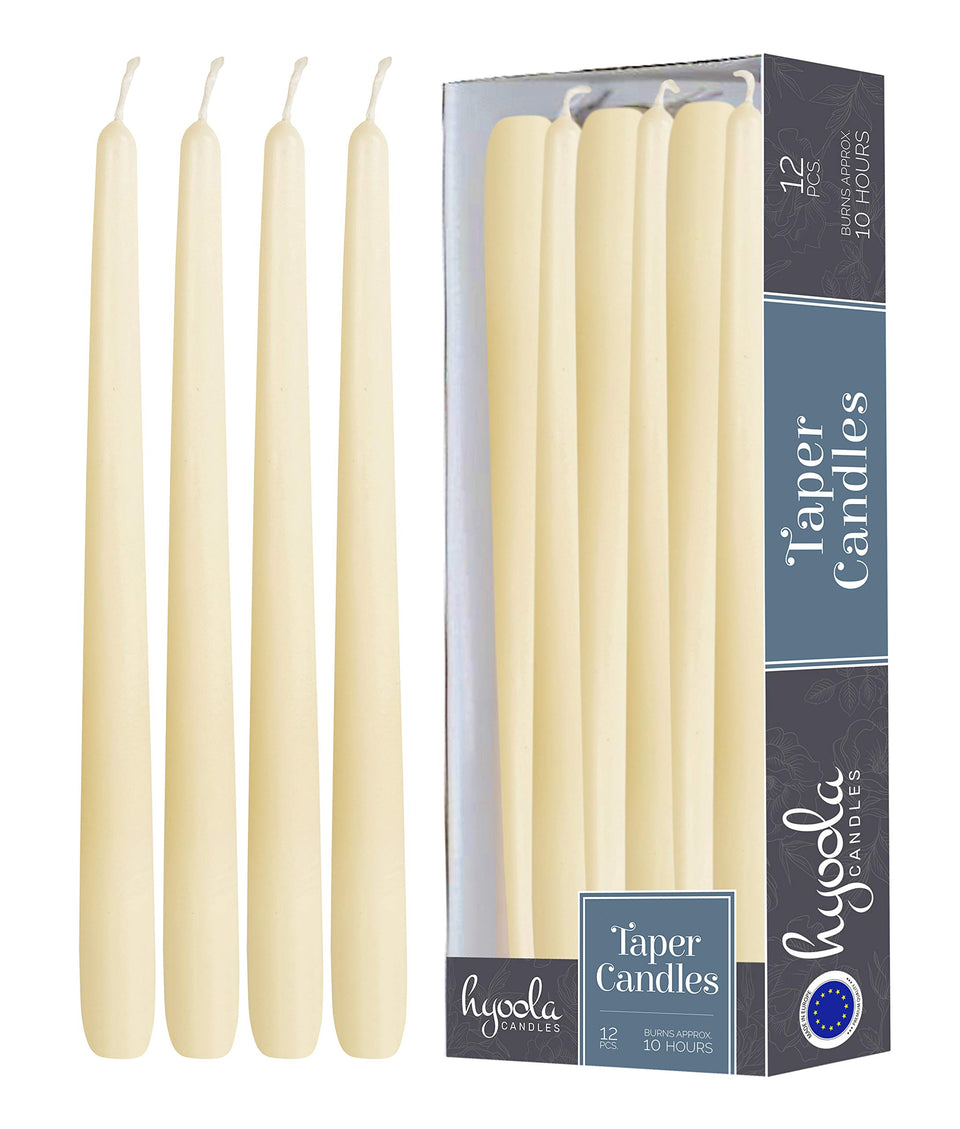 Hyoola 12-pack tall taper candles in woolwhite provide clean, dripless lighting for elegant tables.