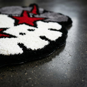 HYPEECE Ka-Ws rug in gamer area adds cozy vibe