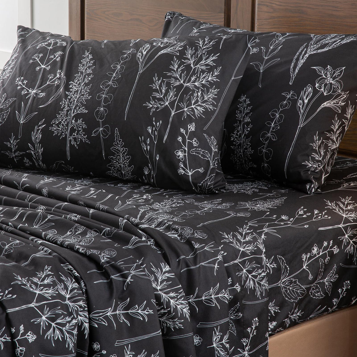 Bedroom scene highlights deep-pocket fit and breathable, smooth texture.