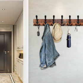 IBosins eight black rustic hooks hold coats, bags, and hats.