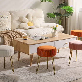 IBUYKE footstool doubles as sofa-side resting spot