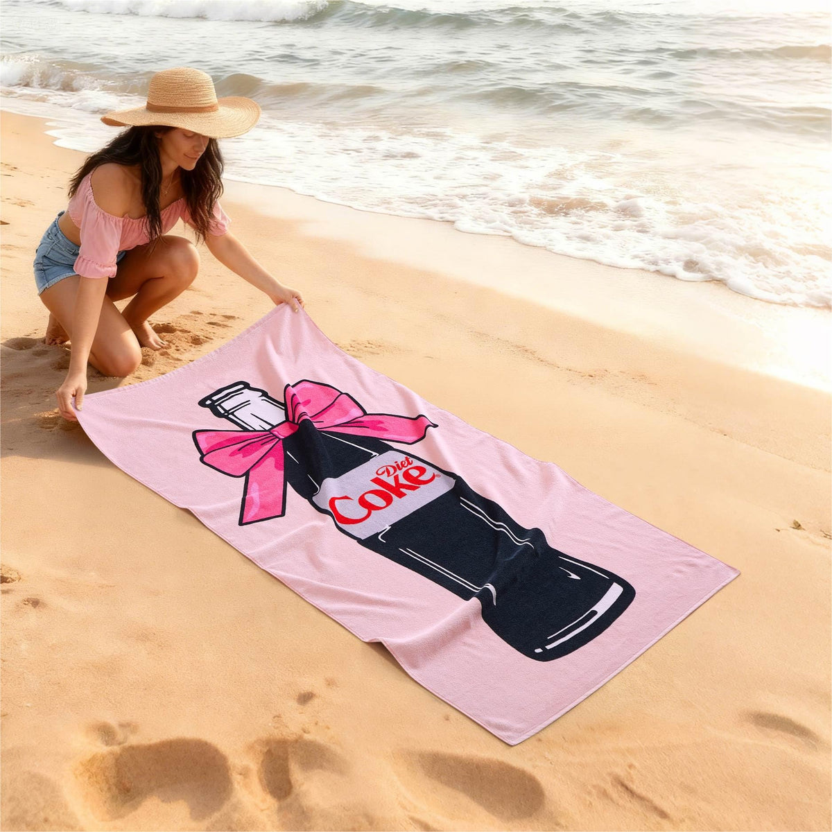 Idea Nuova 30x60 towel shown laid out for beach lounging and sunbathing.
