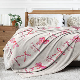 IDELTIME gift-ready pink bow blanket with care tag visible