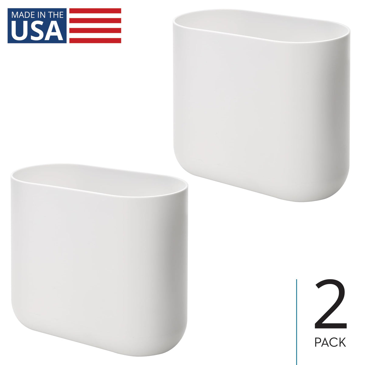 iDesign Cade oval trash can placed under a desk for discreet waste