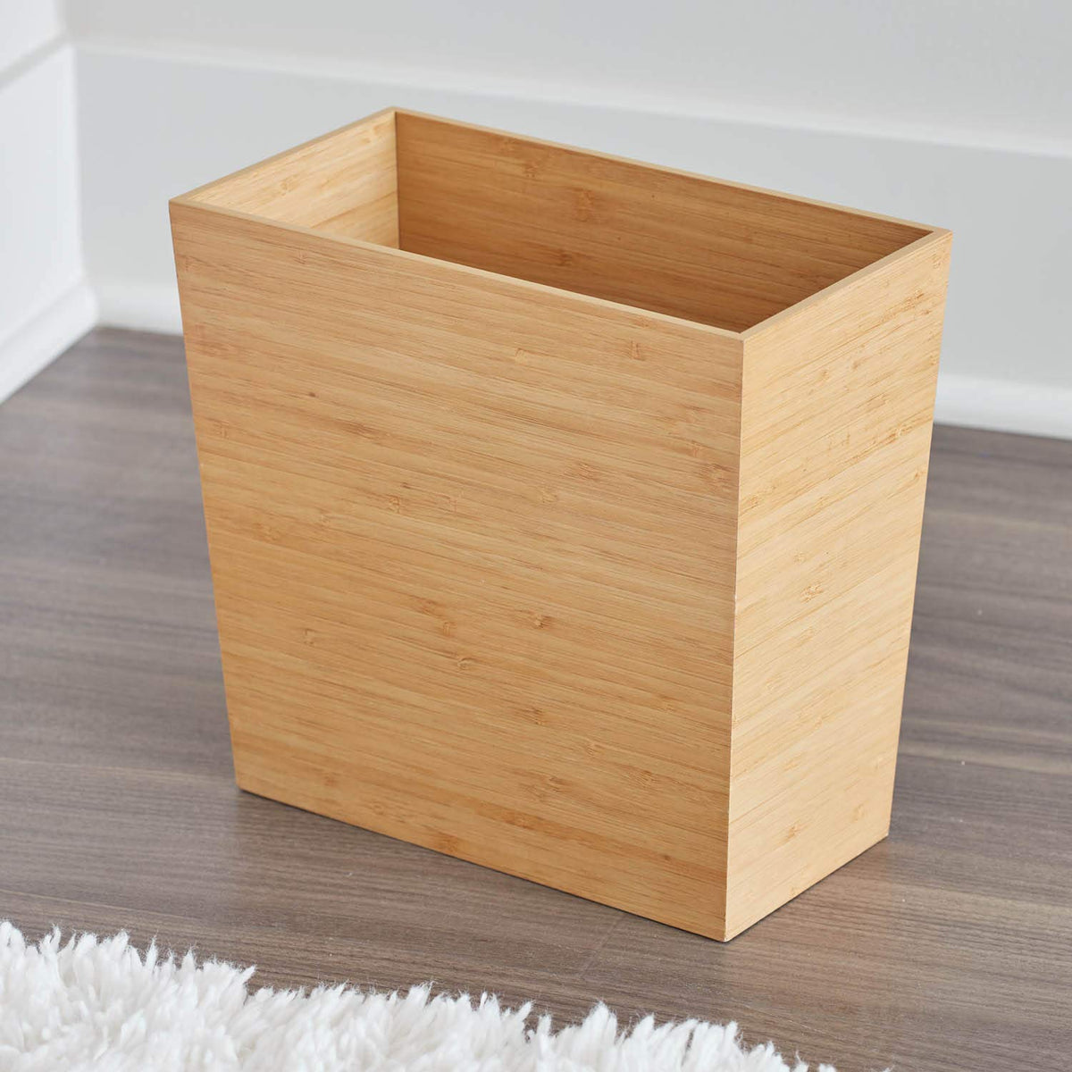 iDesign Formbu compact bathroom bin is ideal for tight spaces.