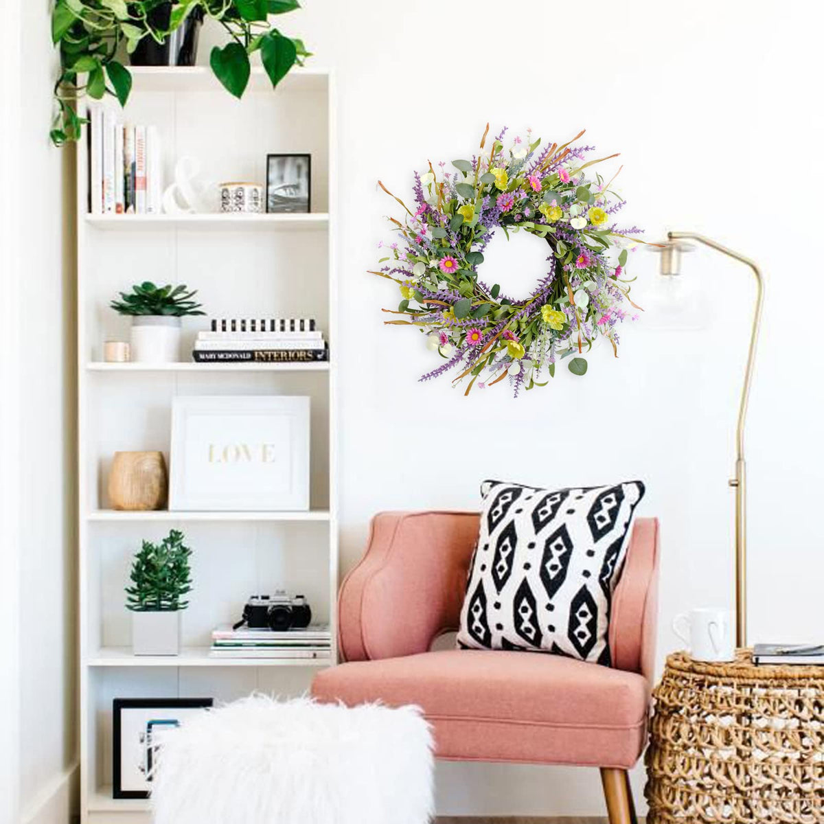 Idyllic daisy wreath on door creates a vibrant seasonal display.