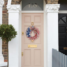 Idyllic front door wreath provides quick, vibrant transform for homes, schools, and shops.