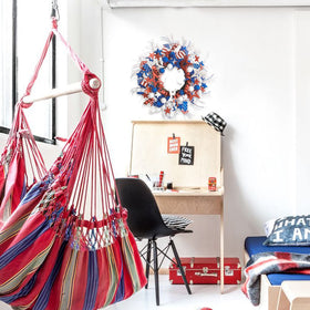 Idyllic glitter stars wreath enhances home decor with seasonal charm.