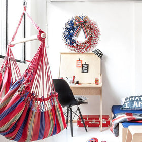 Idyllic Memorial Day flag elements wreath complements seasonal decoration and patriotic spirit.