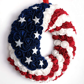Idyllic patriotic wreath hanging on door showcases easy mounting and seasonal charm.
