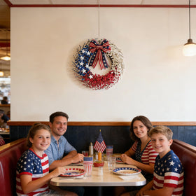 Idyllic patriotic wreath on storefront display signals versatile holiday decor