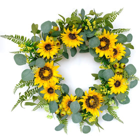 Idyllic 18-inch artificial sunflower wreath on a front door, adding cheerful curb appeal.