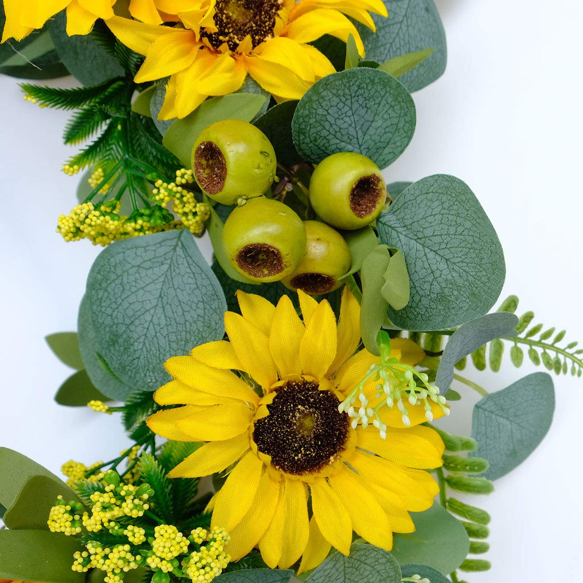 Idyllic sunflower wreath highlighting vibrant yellow tones for exterior spaces.