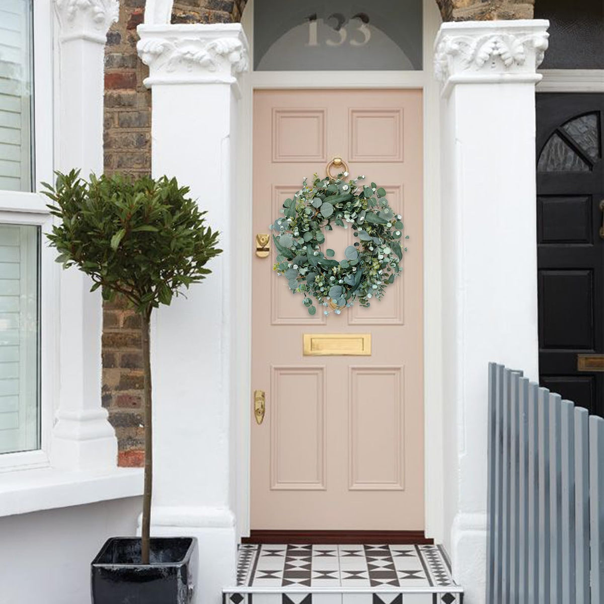 Idyllic wreath suits weddings and events with evergreen ambiance.