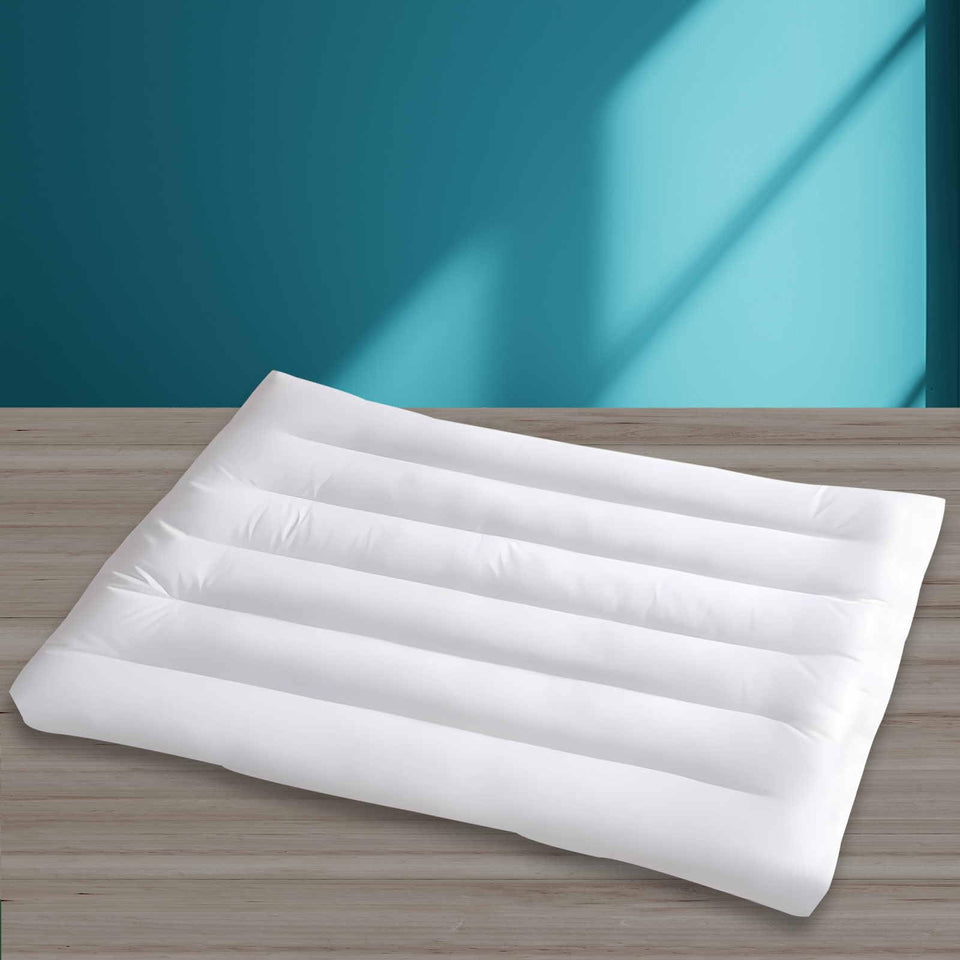 iFaon Ultra Flat Pillow top view on bed showing slim profile for versatile sleep positions.