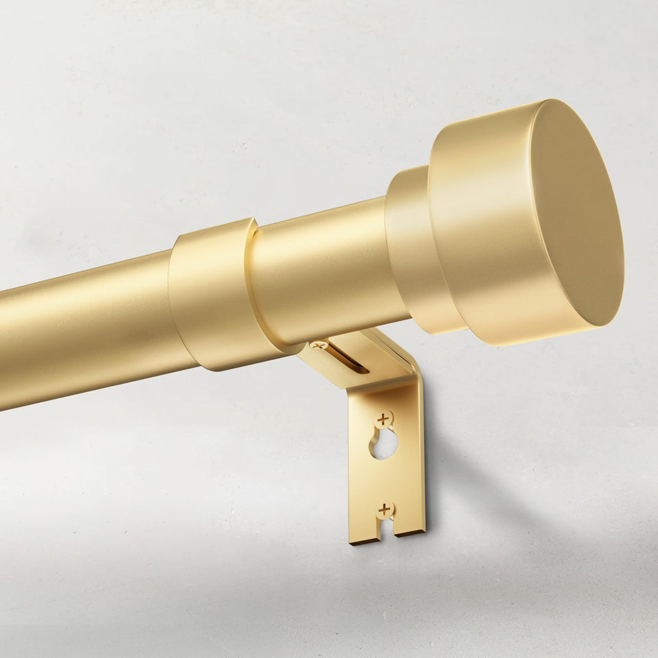 IFELS heavy-duty curtain rod in gold for durable window drapery support.