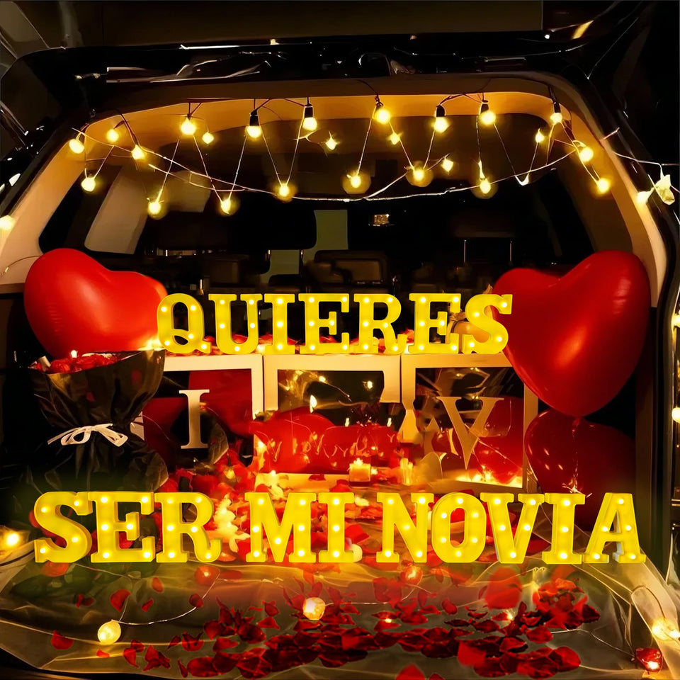 IFNCPF LED letters display glowing warmly for a romantic proposal centerpiece.