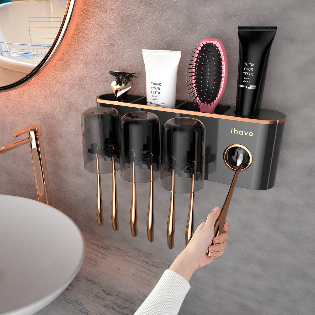 iHave toothbrush holder with toothpaste dispenser mounted on wall for easy access and tidy bathroom