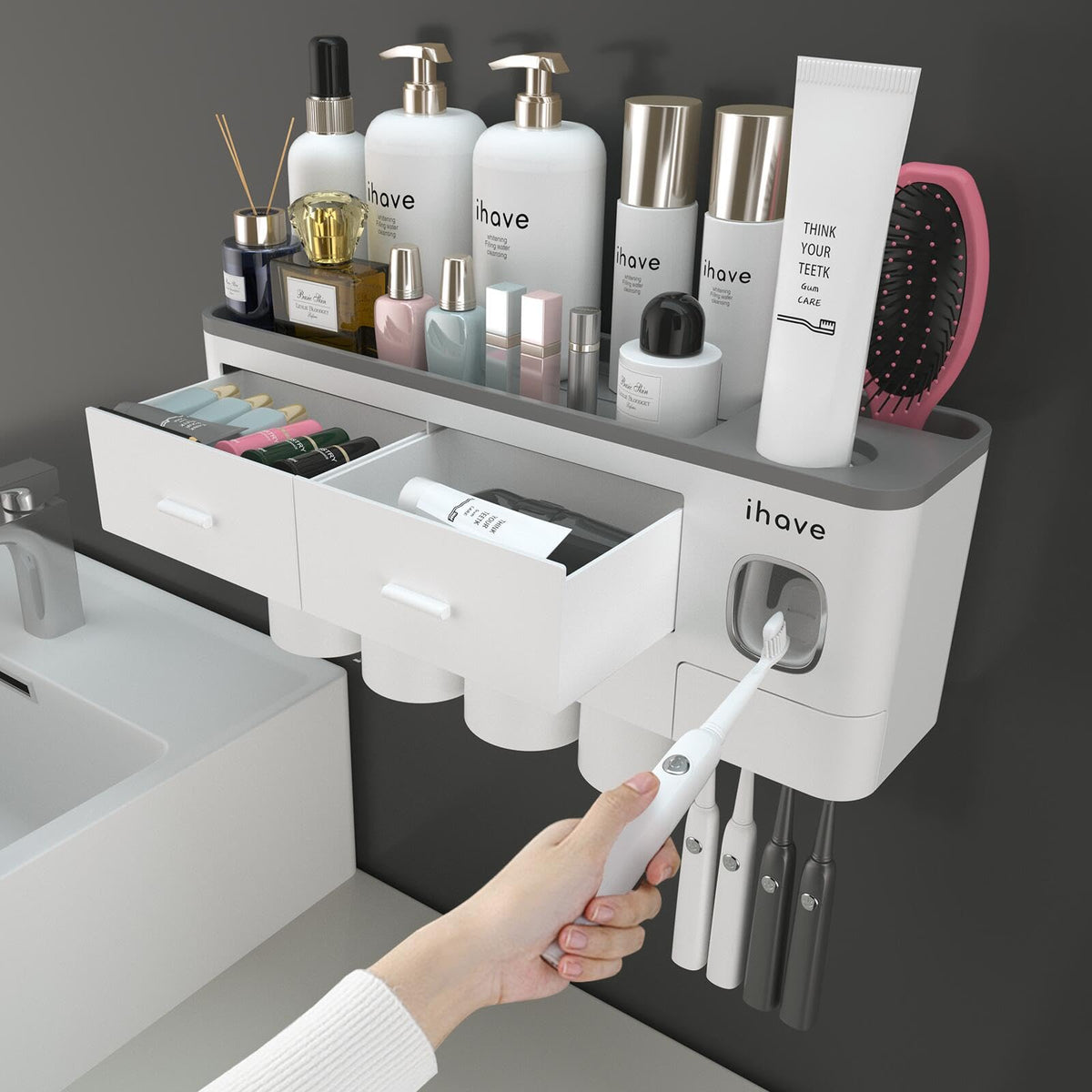 iHave toothbrush holder wall-mounted with toothpaste dispenser keeps the counter tidy.