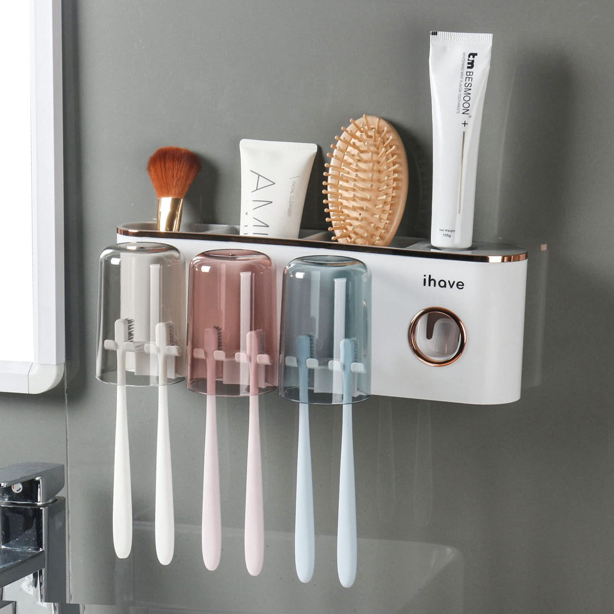iHave wall-mounted toothbrush holders with toothpaste dispenser keep toothbrushes organized.