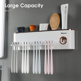 ihave toothpaste dispenser integrated with holder for mess-free toothpaste squeezing.