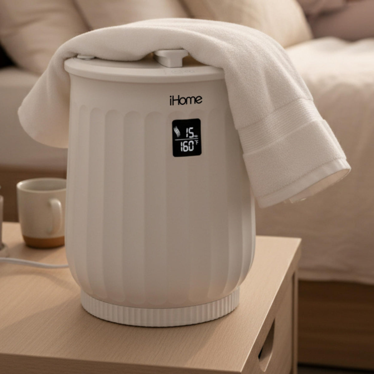 iHome Luxury 20L towel warmer in a bathroom setting with towels