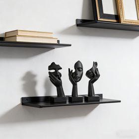 oliruim thinker statue abstract face black gold center pose adds desk depth.