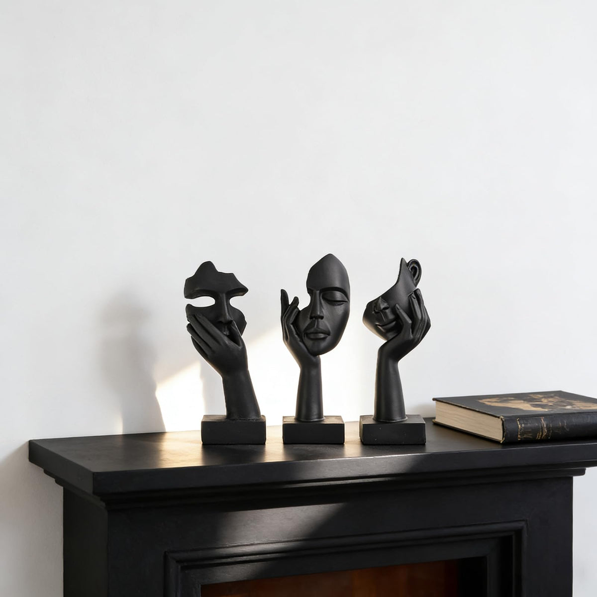 oliruim thinker shelf decor trio brightens bookcase with abstract charm.