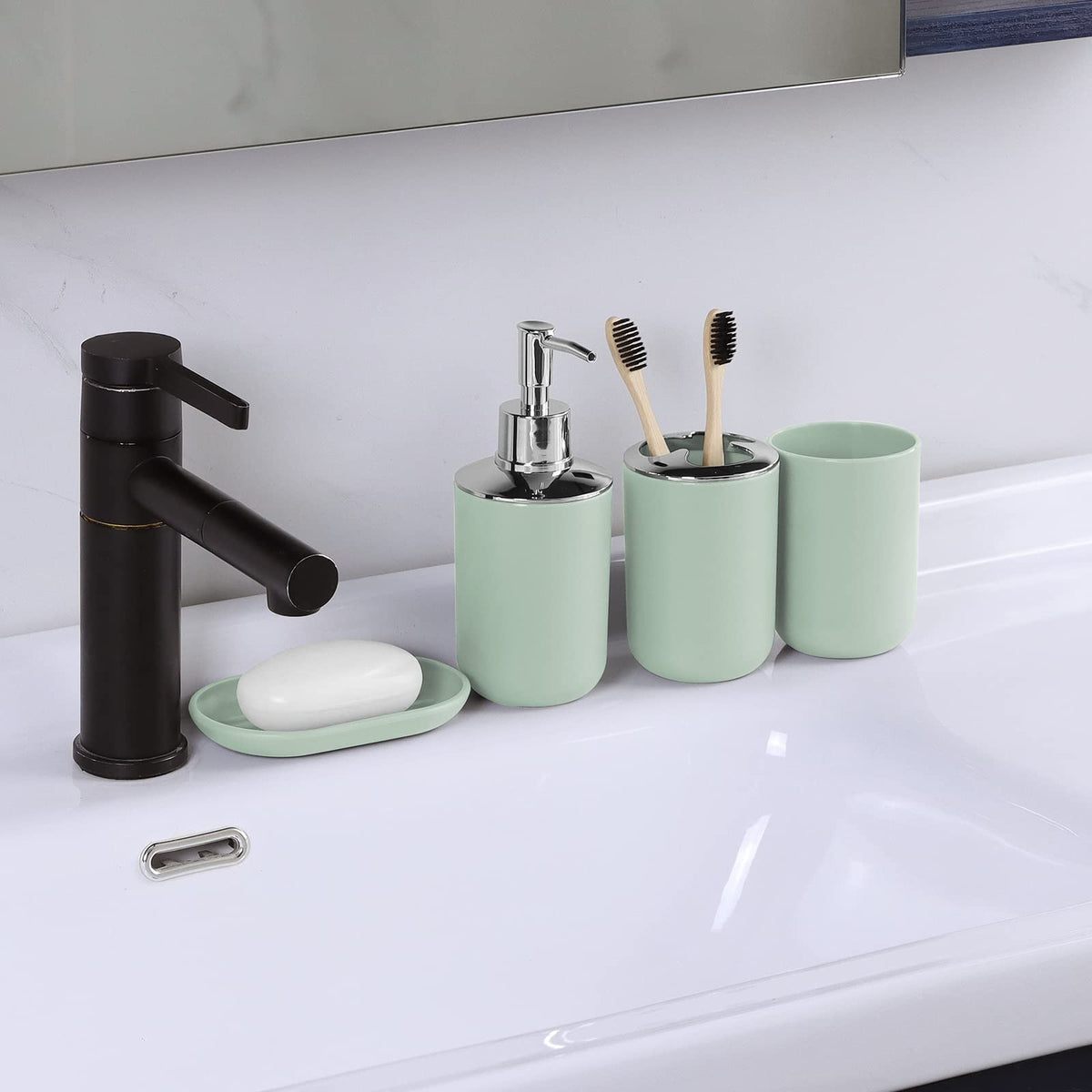 IMAVO toothbrush holder keeps daily essentials neatly accessible in a cohesive green set.