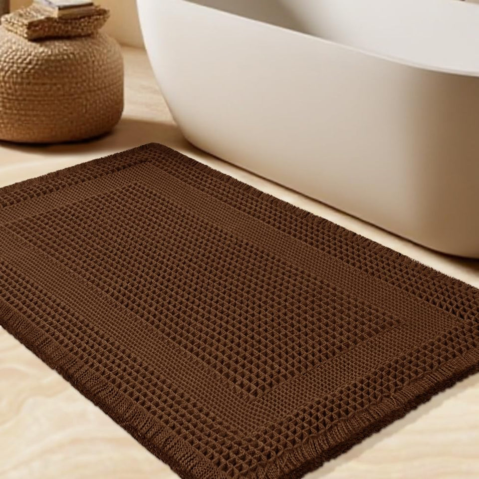 IM HOME waffle bath mat cloud-soft texture for plush comfort after bathing or showering.