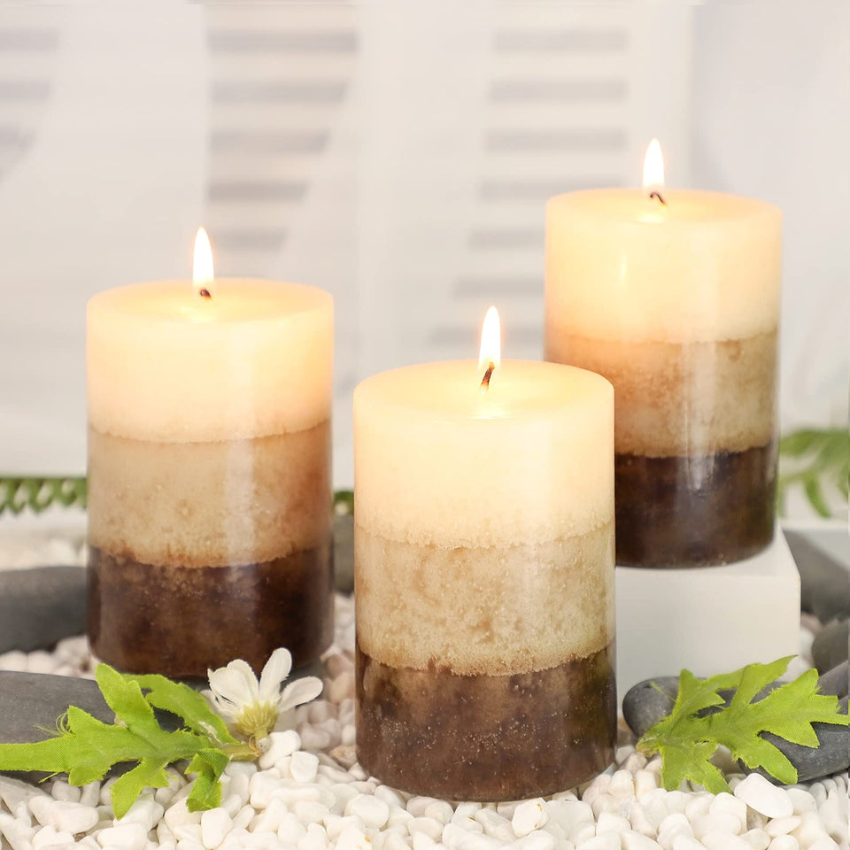 Immeiscent Vanilla Cupcake pillar candle set of 3 glows with inviting aroma for living spaces.