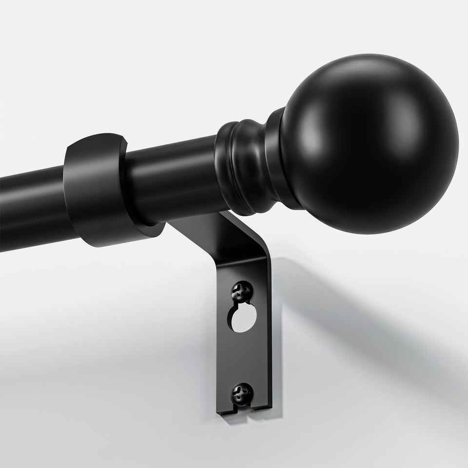 Immiehh black curtain rod with decorative finials for stylish window treatments.