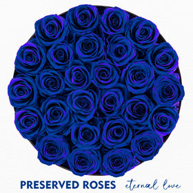 Box opened to reveal Impouo Forever Flowers preserved roses.