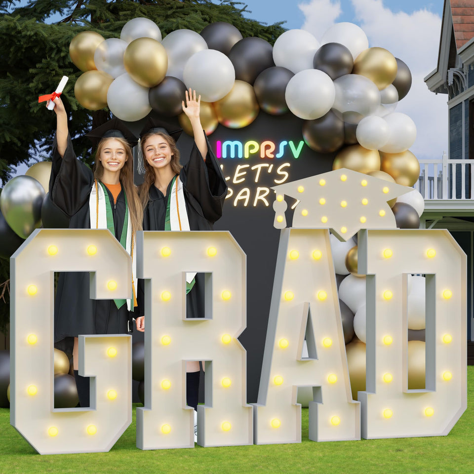 imprsv Grad 4ft light up letters arranged for a photo-ready graduation backdrop