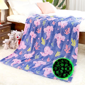 IMUKU axolotl blanket in soft fleece provides cozy warmth for kids and adults.
