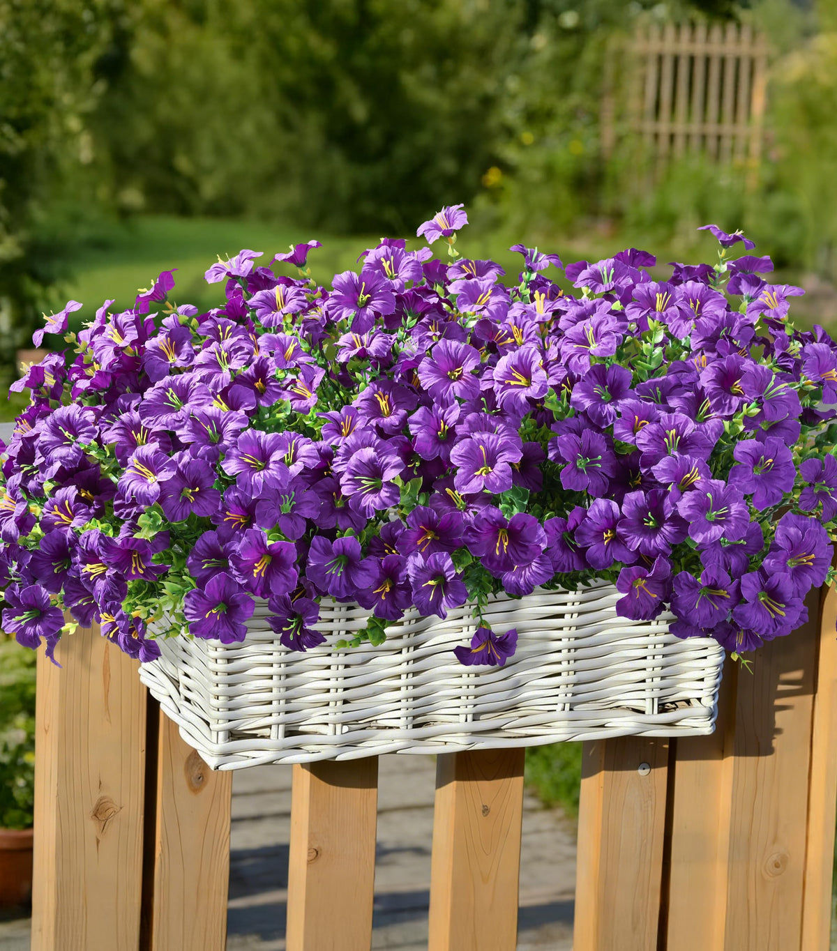 INSPRING purple petunia silk flowers brighten planters and patios.