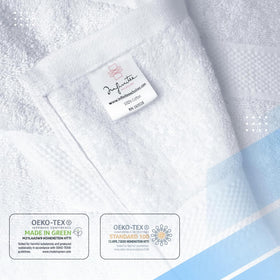 Infinitee Xclusives elegant white towels that complement any decor in home, hotel, or spa.