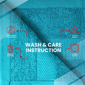 Infinitee Xclusives Teal Hand Towels in a luxury bathroom setting