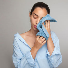 Double stitched Infinitee Xclusives cotton washcloth demonstrates long lasting durability.