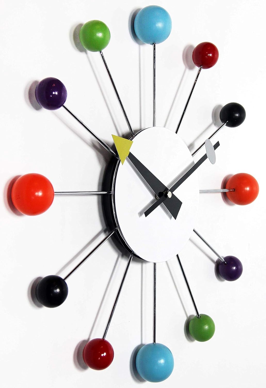 Infinity Instruments Orb Spoke clock uses quiet quartz movement for peaceful rooms.