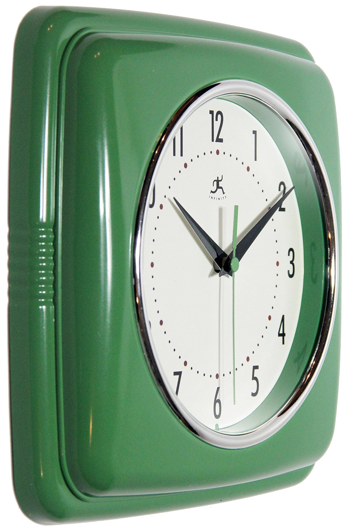 Infinity Instruments retro green clock dial close-up showing glass lens and legible numbers.