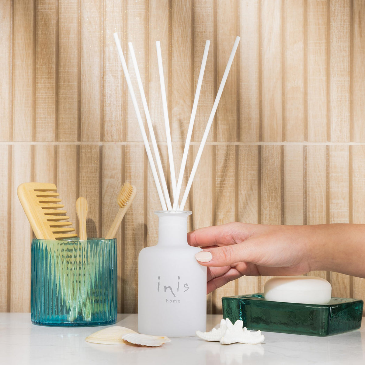 Inis the Energy of the Sea white frosted glass vessel adds elegant diffusion to any decor.