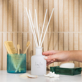 Inis the Energy of the Sea white frosted glass vessel adds elegant diffusion to any decor.