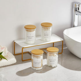 INIUNIK vanity organizer glass adds warm, elegant bathroom decor.