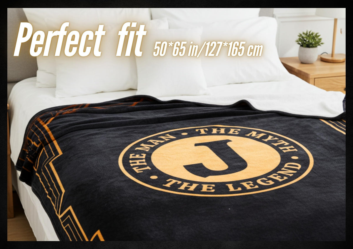 InnoBeta Legend Initial Plush Throw in neutral tones to suit masculine decor