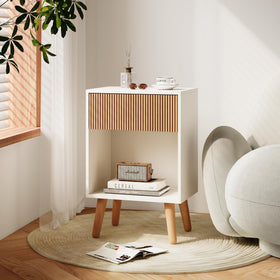 Bedroom arrangement featuring INNOD Fluted Nightstand beside bed for lamps and decor