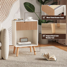 Solid wood legs and top of INNOD Fluted Nightstand in a cozy bedroom scene