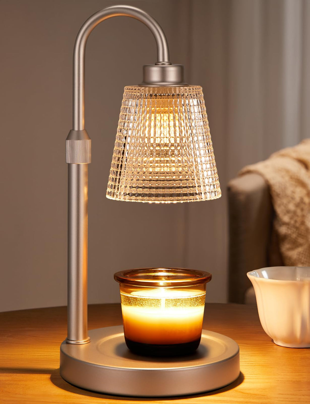 Innqoo champagne gold candle warmer base glows safely for flame-free wax melting.
