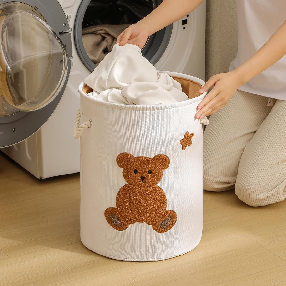 INough Kids Laundry Basket with drawstring closure keeps contents tidy.